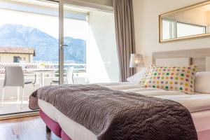 Letto o letti in una camera di Smart-HOTEL MINUSIO, a Swiss Quality Hotel