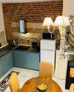 Gîte du Château d'Esnes tesisinde mutfak veya mini mutfak