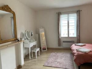 Postel nebo postele na pokoji v ubytování Gîte de charme avec SPA dans le magnifique château d'Esnes