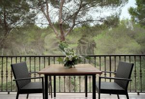 A balcony or terrace at Es Baulo Petit Hotel