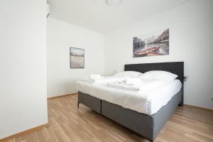 Posteľ alebo postele v izbe v ubytovaní Charming Apartment with Balcony, Close to Stephansdom Cathedral