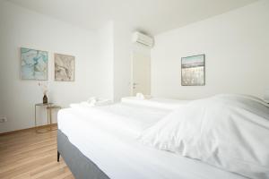 Posteľ alebo postele v izbe v ubytovaní Charming Apartment with Balcony, Close to Stephansdom Cathedral