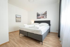 Posteľ alebo postele v izbe v ubytovaní Charming Apartment with Balcony, Close to Stephansdom Cathedral