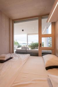 Ένα ή περισσότερα κρεβάτια σε δωμάτιο στο Sun Deck Buqez Villa 70