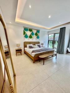 Giường trong phòng chung tại Villa Maureen +29 ảnh