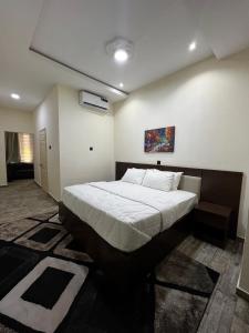 Fragrance Apartments and Suites客房内的一张或多张床位