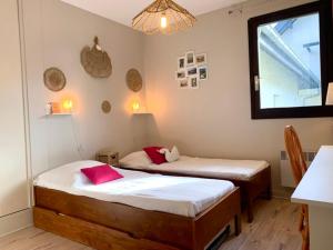 Ein Bett oder Betten in einem Zimmer der Unterkunft Appartement Annecy, 3 pièces, 6 personnes - FR-1-432-4