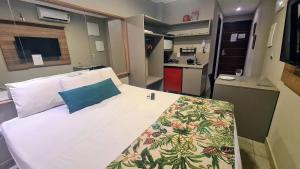 Una cocina o cocineta en Uno Flats - By EasyHost