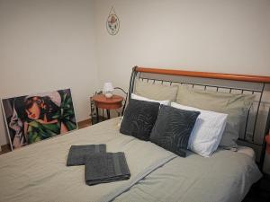 a bed with a number on top of it at Atlas Apartment in the historical center of Košice with free private parking in Košice