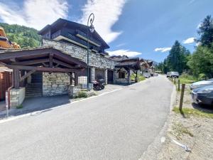 a house on the side of a road at Appartement Val-d'Isère, 5 pièces, 8 personnes - FR-1-518-94 in Val-d'Isère
