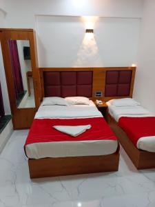 Postel nebo postele na pokoji v ubytování Hotel airport annex