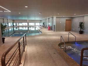 Kolam renang di atau dekat dengan Hotel Laghetto Resort Golden