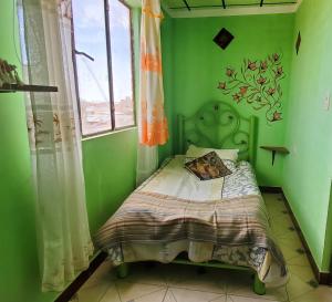 Кровать или кровати в номере Hostal Golden Quinua