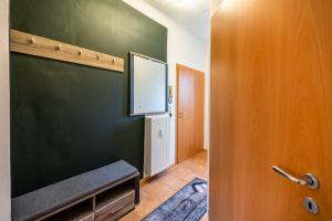 TV a/nebo společenská místnost v ubytování Modernes Appartement