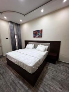 Fragrance Apartments and Suites客房内的一张或多张床位
