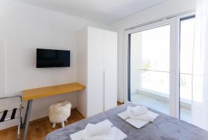 TV a/nebo společenská místnost v ubytování Villa Plava Voda Luxury Villas