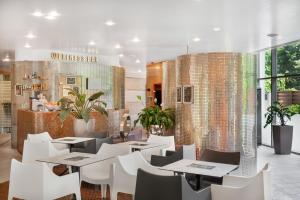 Restoran või mõni muu söögikoht majutusasutuses Hotel Divinus