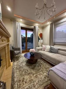 a living room with a couch and a table at Family house in Wieliczka