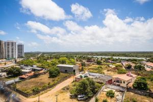 an aerial view of a small town in a city at Áurea Guedes #901A - Apartamento por Carpediem in Natal
