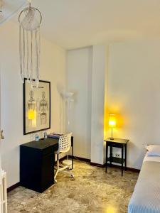 Postel nebo postele na pokoji v ubytování Milano Guest House