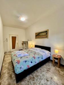 Postel nebo postele na pokoji v ubytování Milano Guest House