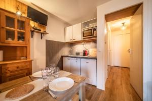 Kuchyň nebo kuchyňský kout v ubytování Appartement Morillon 4pers