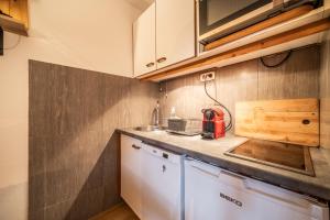 Kuchyň nebo kuchyňský kout v ubytování Appartement Morillon 4pers