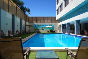 Bazén v ubytování MENA Tyche Hotel Amman nebo v jeho okolí