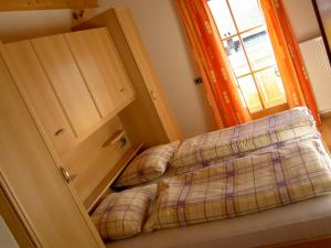 Postel nebo postele na pokoji v ubytování Apartment Oberhauserhof