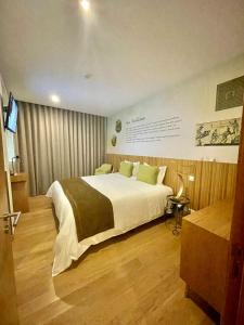 Кровать или кровати в номере Castelo Hotel