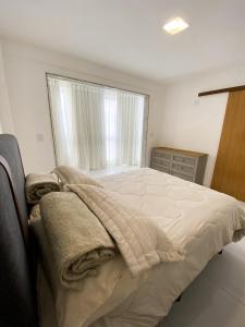 Katil atau katil-katil dalam bilik di Apartamento no coração de Domingos Martins