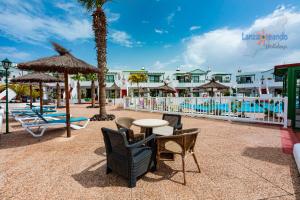 Der Swimmingpool an oder in der Nähe von Vivienda Vacacional Casa Mar y Volcan Vista mar Piscina Playa 5 min Wifi