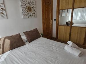 A bed or beds in a room at IMEDA Penibetico Sierra Nevada