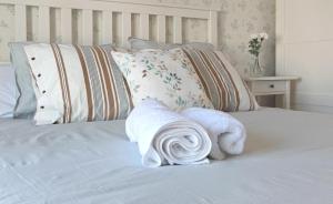 Cama o camas de una habitación en Alojamientos Rurales Las Candelas