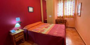 Łóżko lub łóżka w pokoju w obiekcie Quéntar Hotel Rural