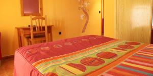 Łóżko lub łóżka w pokoju w obiekcie Quéntar Hotel Rural