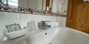 Łazienka w obiekcie Quéntar Hotel Rural