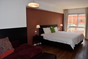Postel nebo postele na pokoji v ubytování Hotel BA Abasto