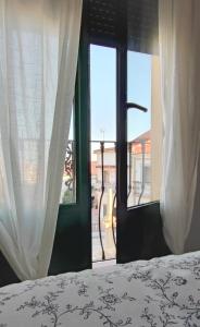 Cama o camas de una habitación en Alojamientos Rurales Las Candelas