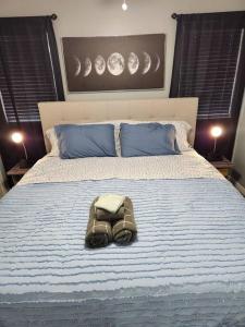 Un ou plusieurs lits dans un hébergement de l'établissement Blue Shark G9 - Midtown 1BR King Suite