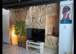 A television and/or entertainment centre at Costa Maresme, Barcelona, Clarks 3 Bdr TownHouse