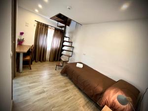 Posteľ alebo postele v izbe v ubytovaní Hotel Pinguino
