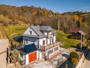 an aerial view of a house with a roof at Willa Anna Maria in Szczawnica