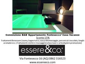 ラクイラにあるAppartamento Fonteseccoの緑のプール付きのウェブサイト