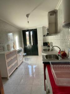 A kitchen or kitchenette at Piso BOLBORETEIRO