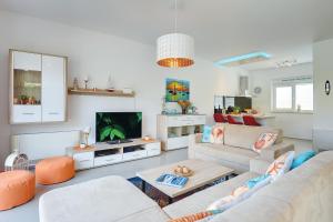 Posezení v ubytování Villa Sky Dream