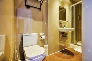 Ett badrum på Huttons Hotel, Victoria London