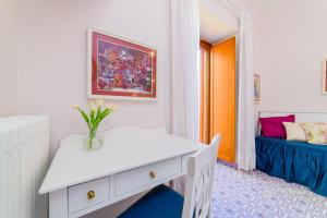Postel nebo postele na pokoji v ubytování Hotel La Bussola