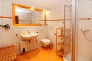 Ένα μπάνιο στο Ferienwohnung Strand25 +14 φωτογραφίες
