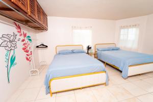 Katil atau katil-katil dalam bilik di Belle Air Seaview- Entire Home (5 Bdrm 5Bath)